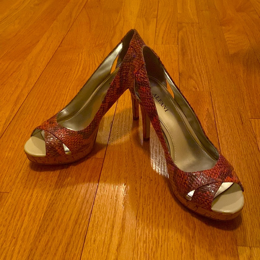 Red snake print heels